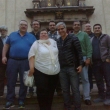 Turismo incentivo. Grupo de hombres empleados de Siemens de Buenos Aires, septiembre de 2016 delante de la iglesia donde se guarda el Nio Jess de Praga